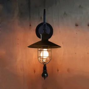 Industrial Sconce Light with Adjustable Pulley - Black Finish, Clear Glass, and Caged Design