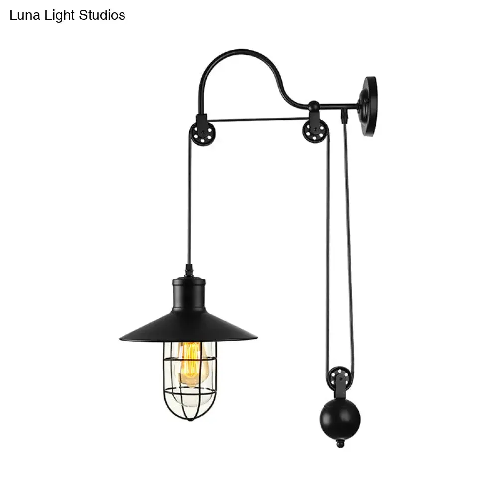 Industrial Sconce Light with Adjustable Pulley - Black Finish, Clear Glass, and Caged Design