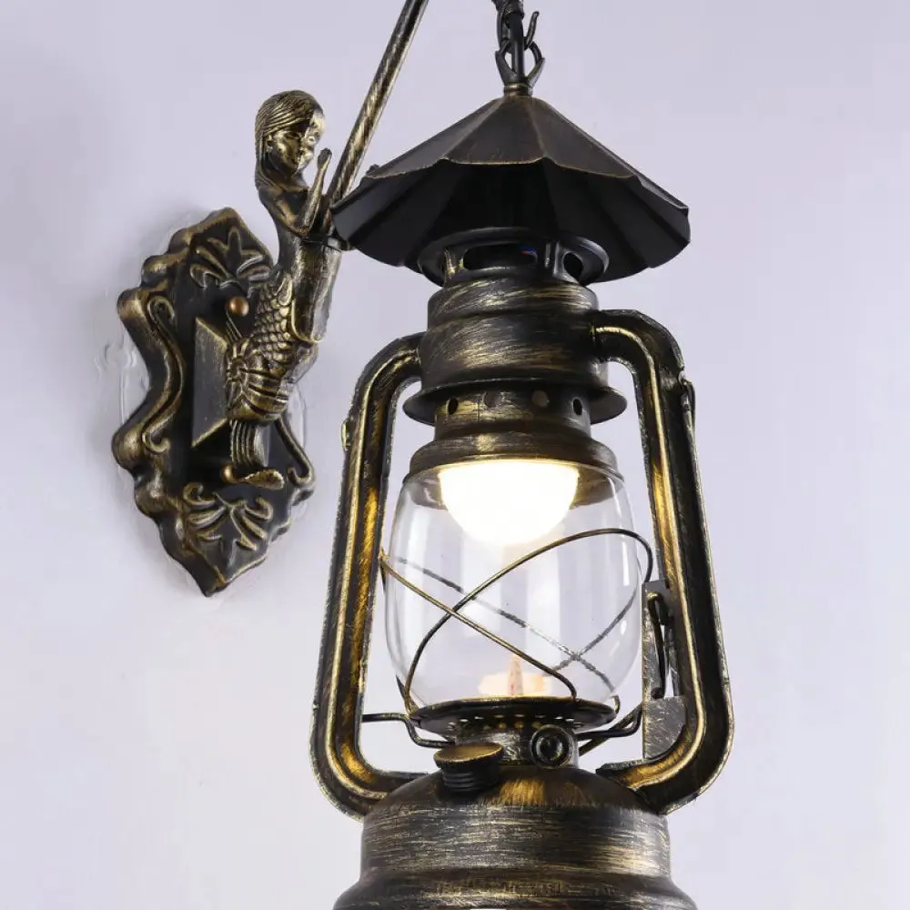 Nautical Clear Glass Kerosene Wall Sconce with Curved Arm for Restaurants