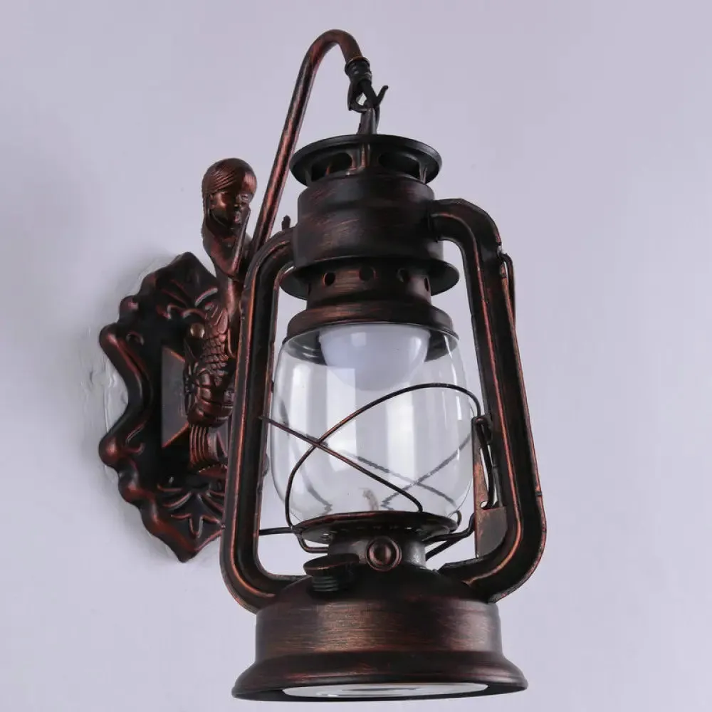 Nautical Clear Glass Kerosene Wall Sconce with Curved Arm for Restaurants