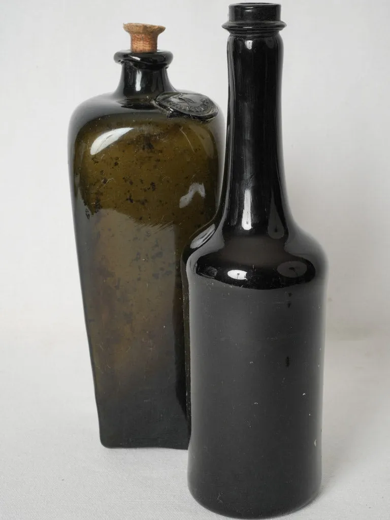 Set of 2 English antique blown glass bottles