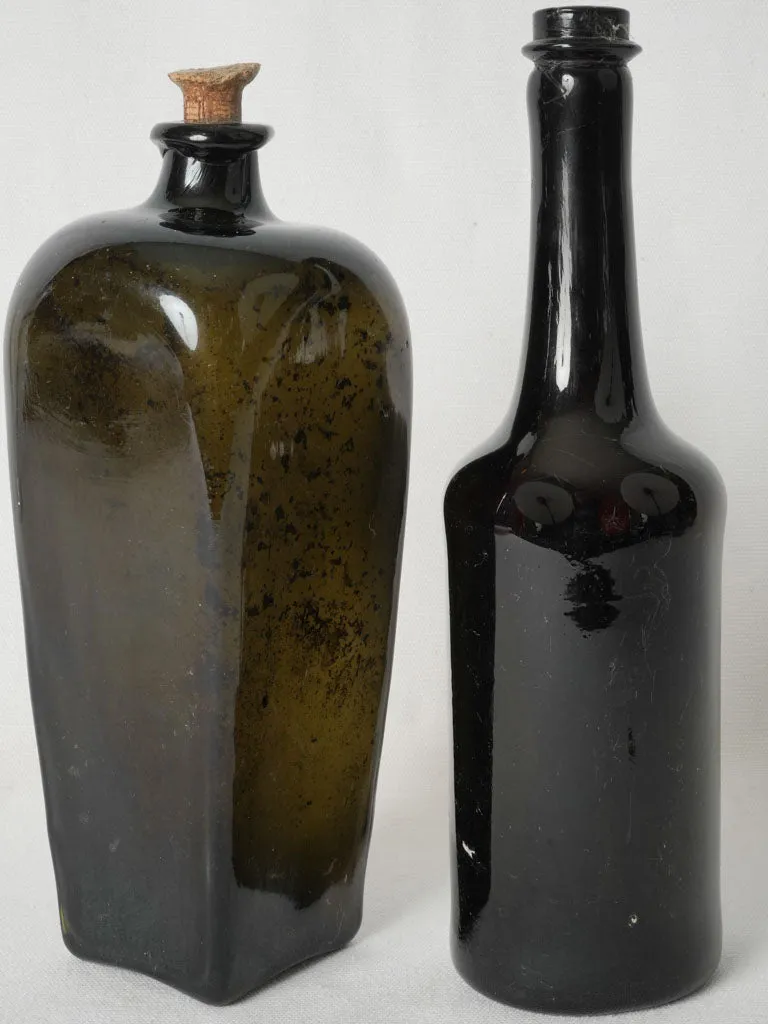 Set of 2 English antique blown glass bottles