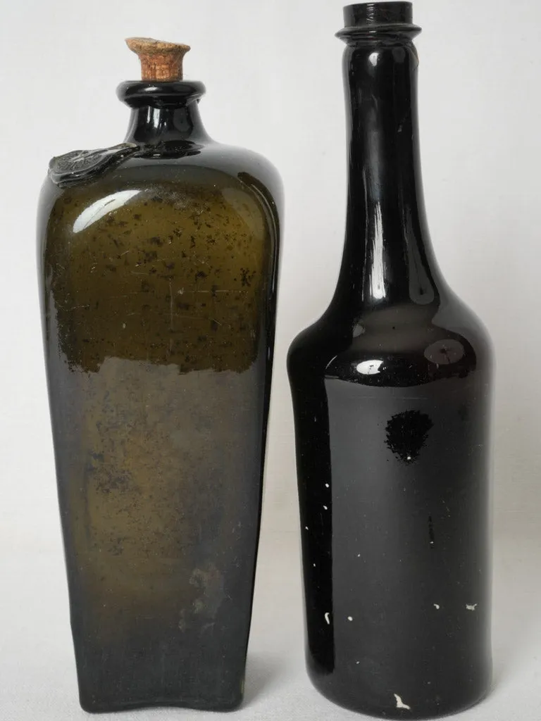 Set of 2 English antique blown glass bottles